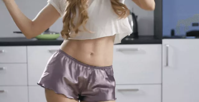A Woman Moving Her Hips and Waist