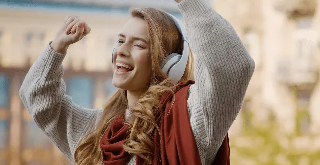 A Woman Listening to Music