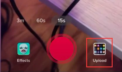 Tap Upload and select a pre-recorded TikTok video